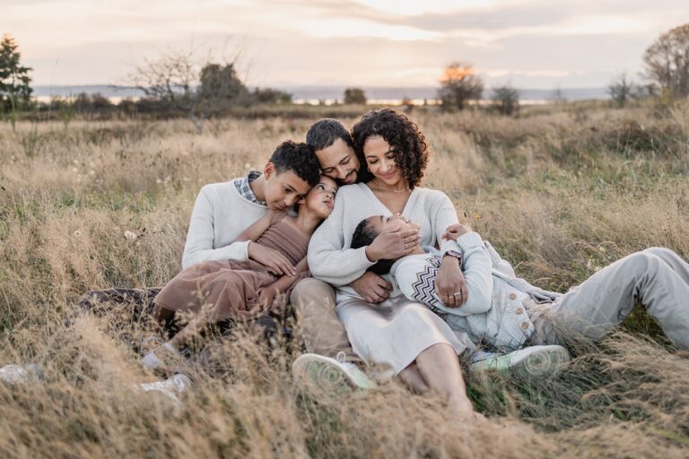 A family photo in a field with nice color tone