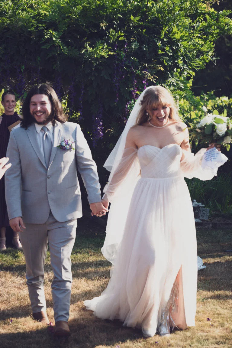 wedding photography of a couple holding each other's hands