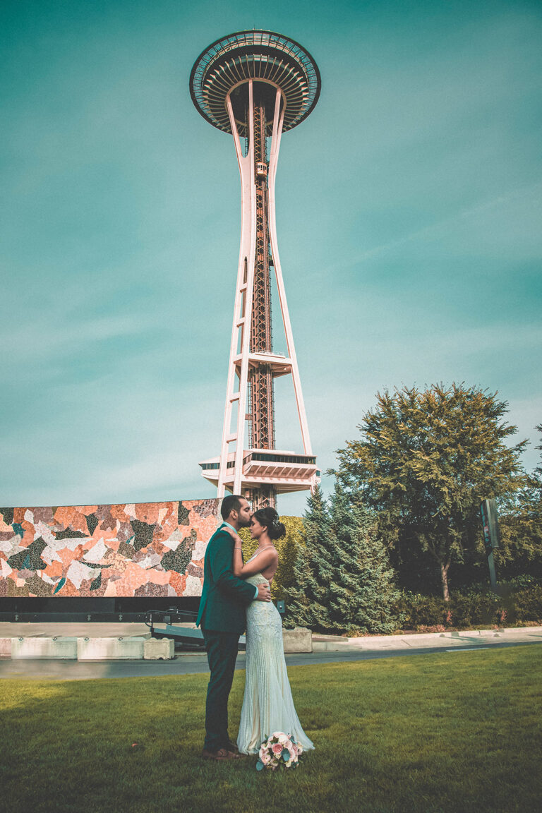 Wedding photo of a couple in Seattle with the Space Needle in the background