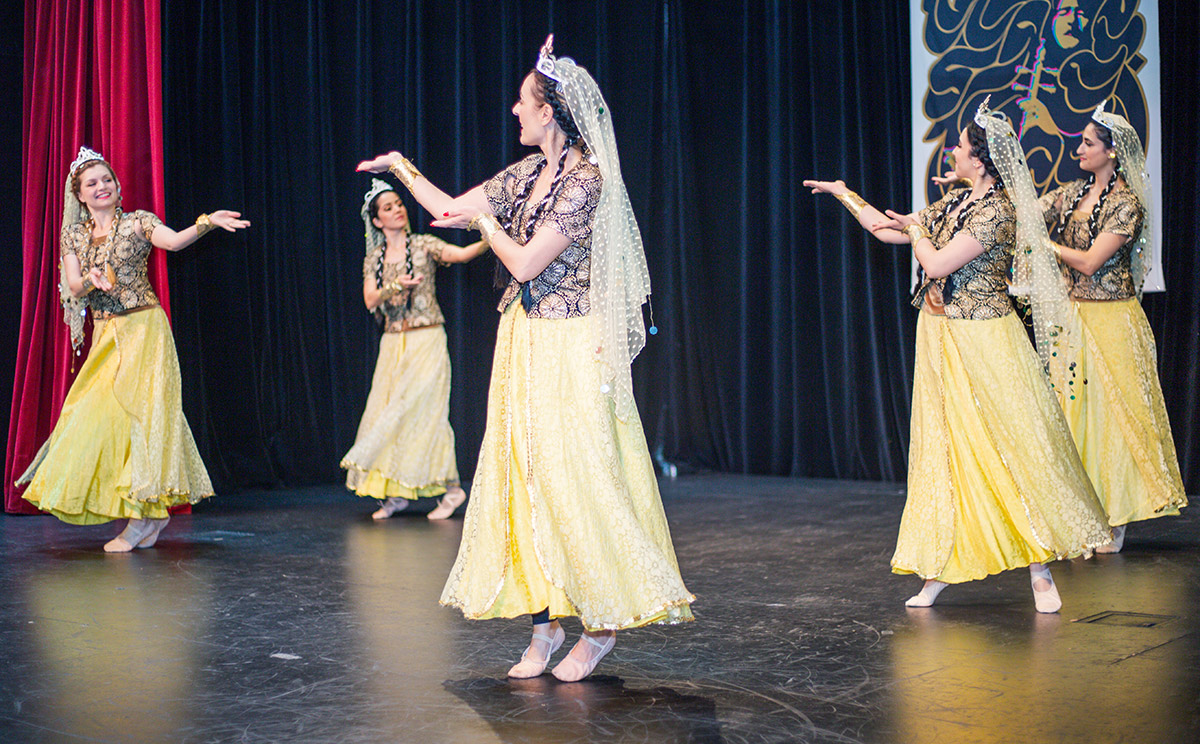 Persian women dancing on the stage.