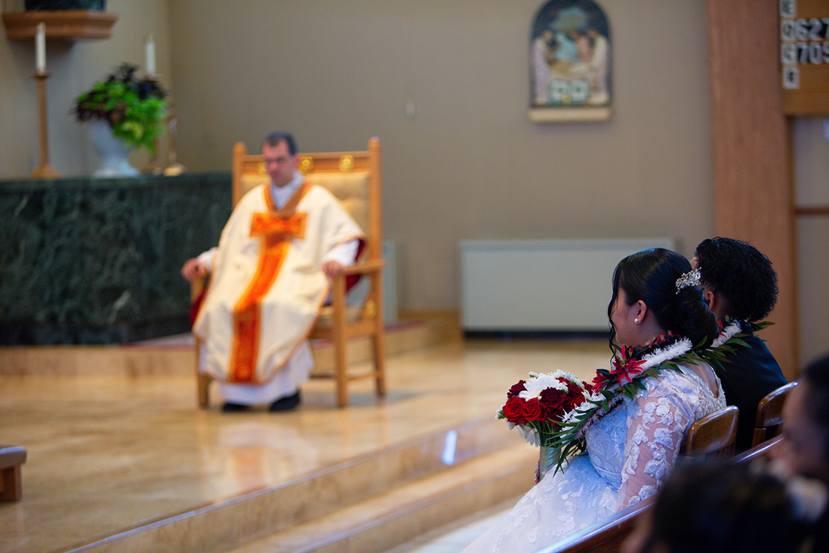 The photo of a couple's wedding day in the church.