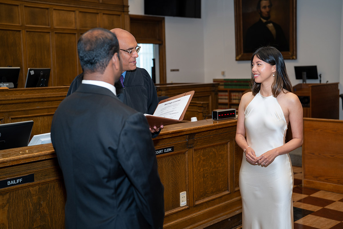 The bride and groom are taking the marriage oath