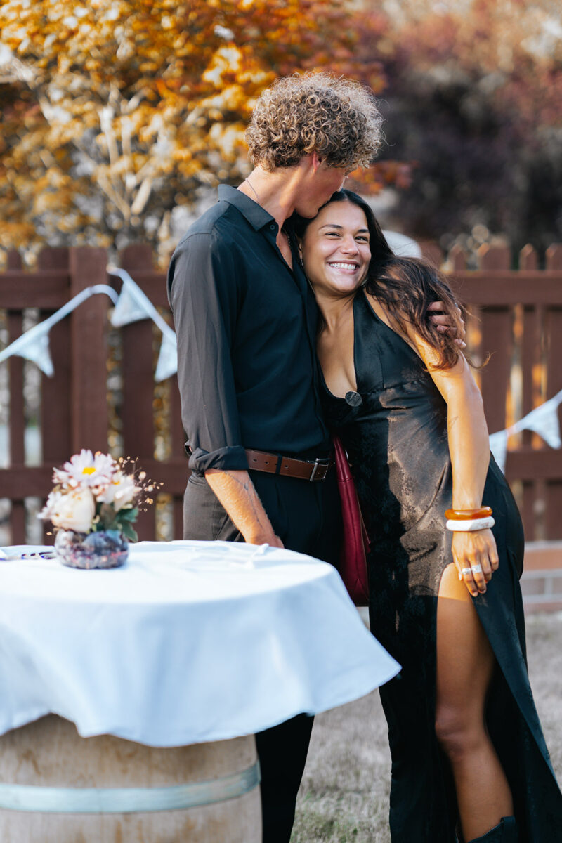 a stunning shot of a couple laughing naturally outdoors in Seattle