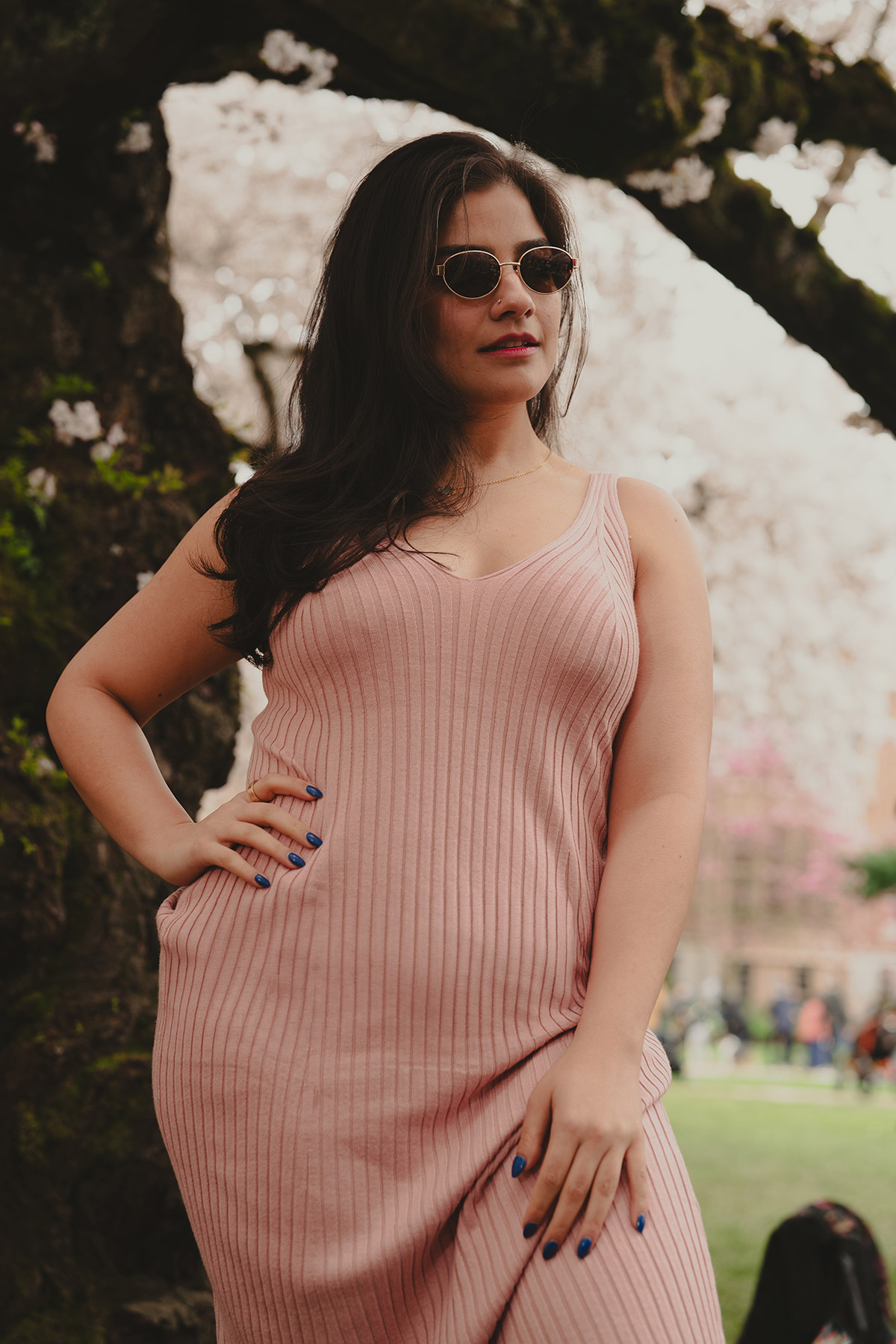 A beautiful portrait of a woman with pink outfit