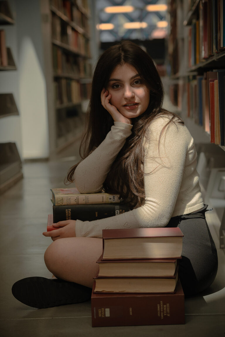 portrait of a girl with her hand under her chin