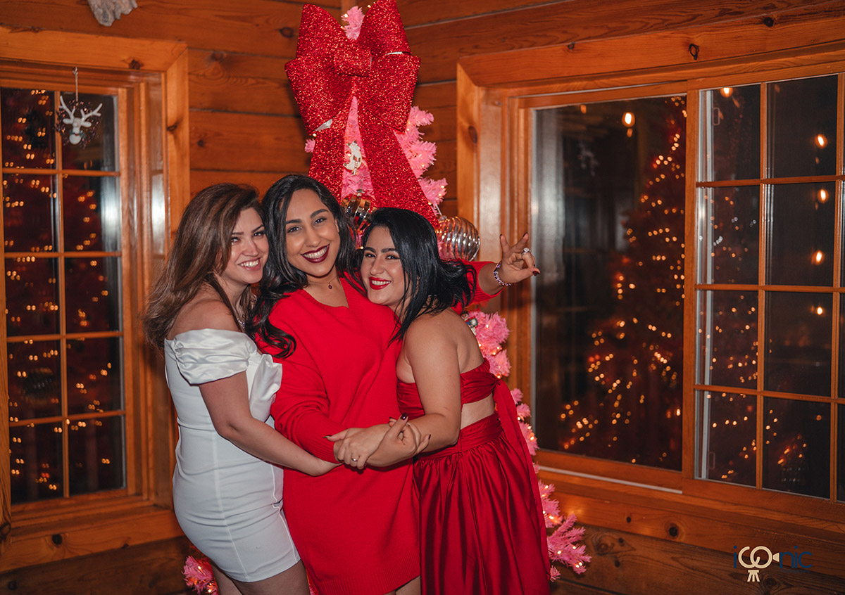 Women in red Christmas photo.