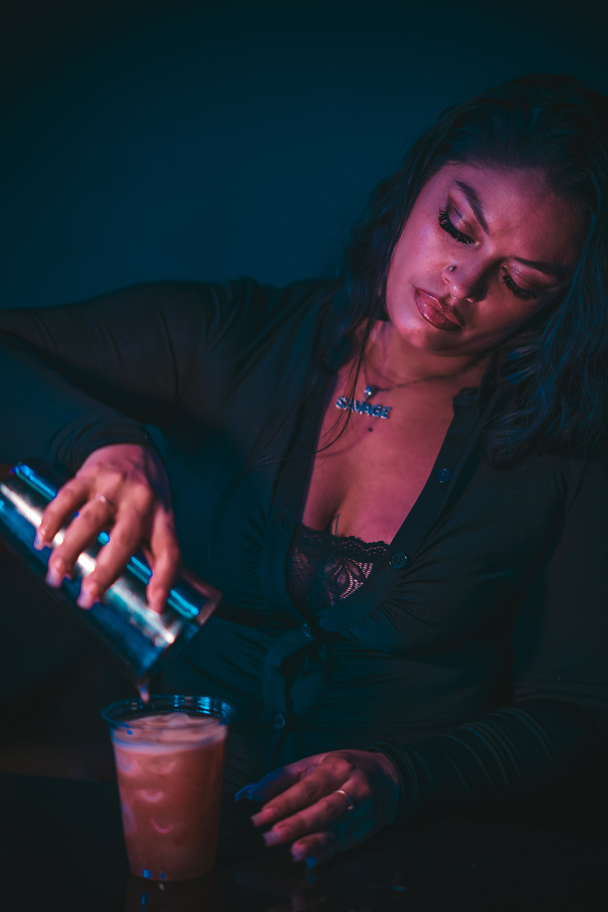A woman filling a cup