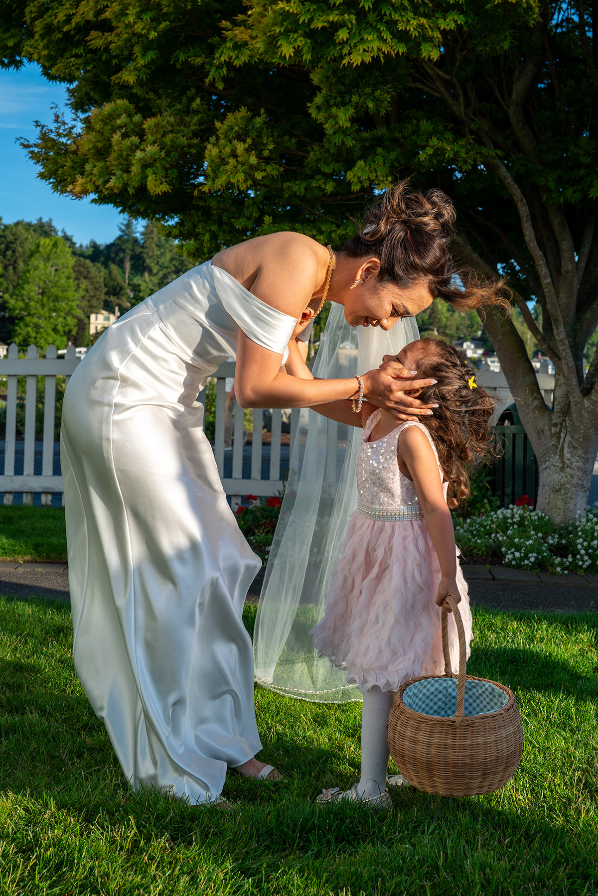 A cute photo of the bride and a kid.