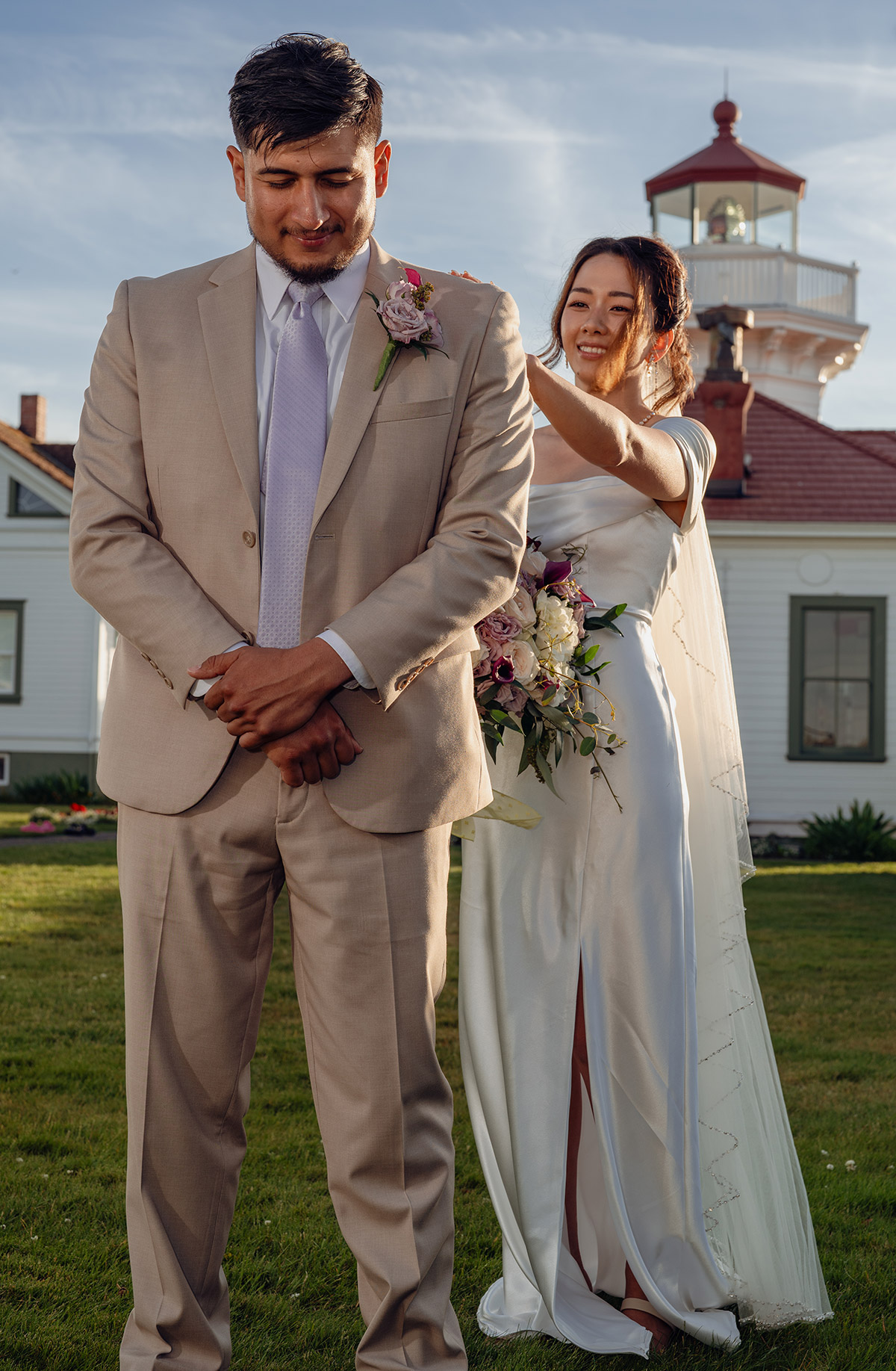 Wedding picture of a couple that the groom sees the bride for the first time