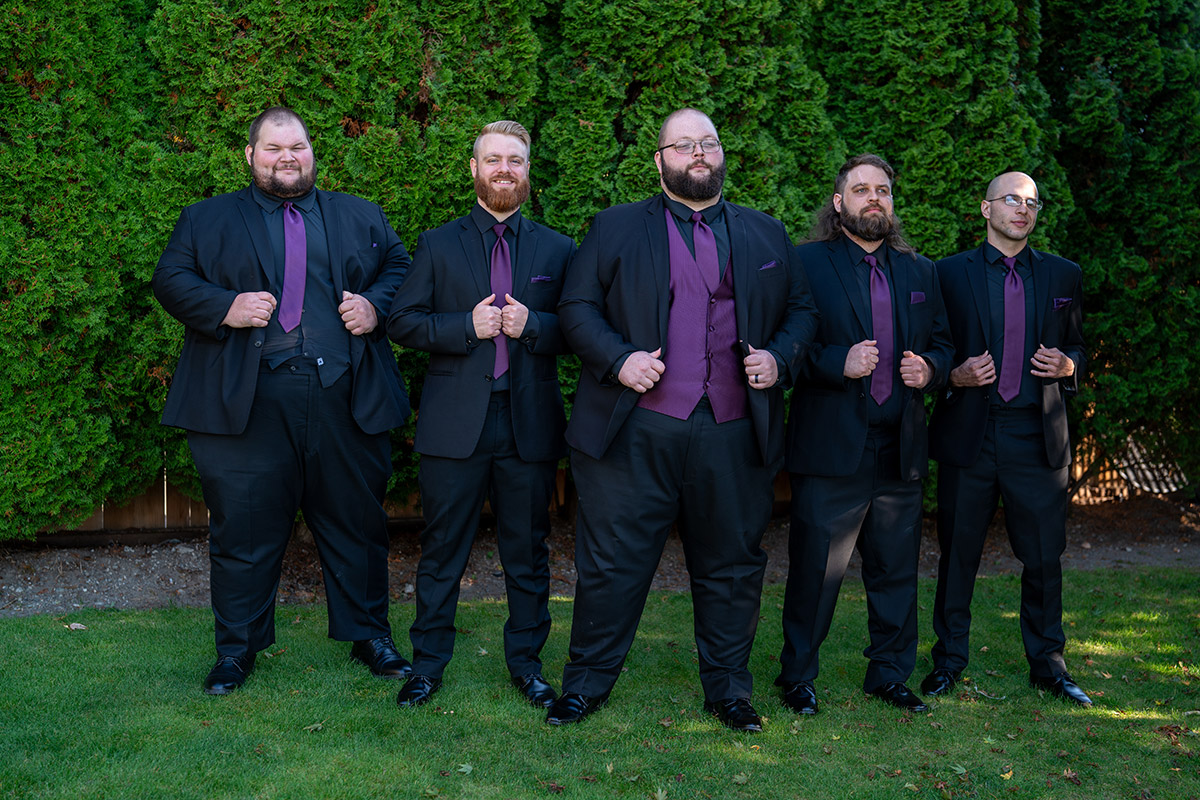 The groom and his wingmen posing for the camera.