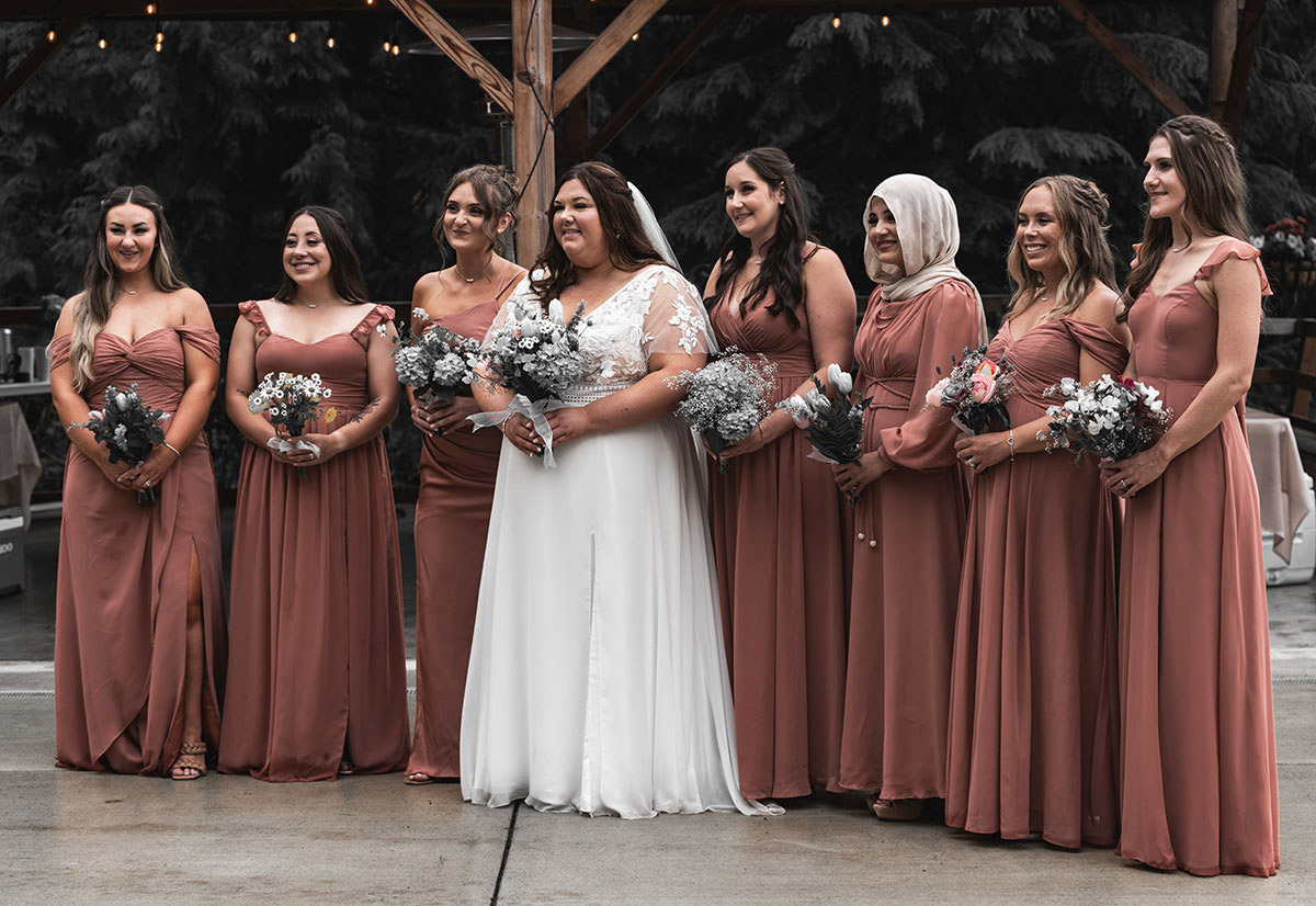 A photo of the bride with here wingwomen